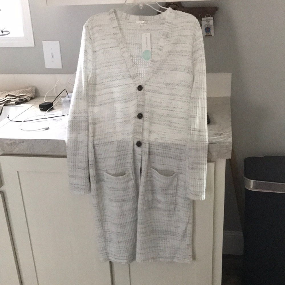 Brand new nine Britton 5 button closure long light weight sweater